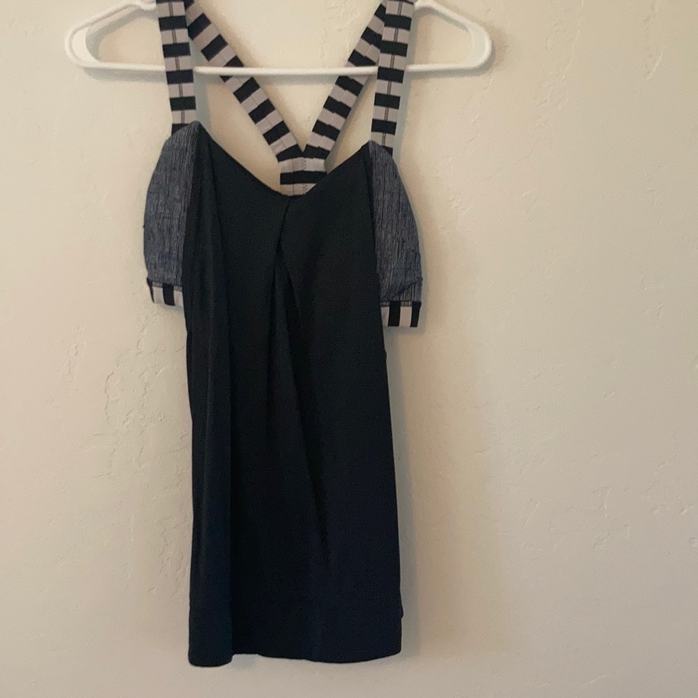 Lululemon tank top. Built in bra. Size 6. Black and white